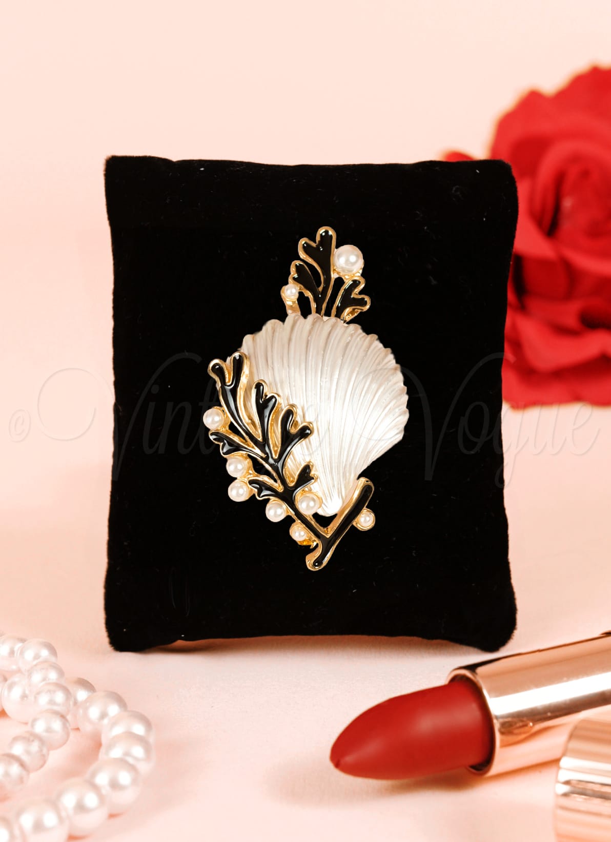 Shell brooch discount
